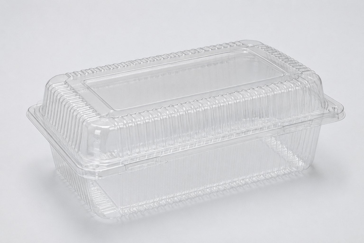 Clear disposable thermoformed food container with hinged lid