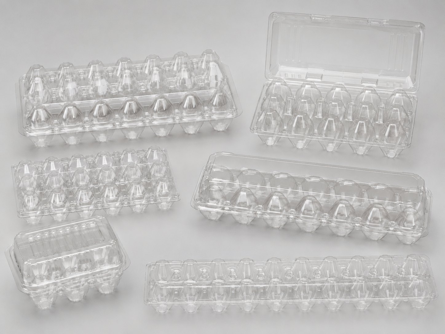 Clear thermoformed plastic egg packaging trays and clamshell containers